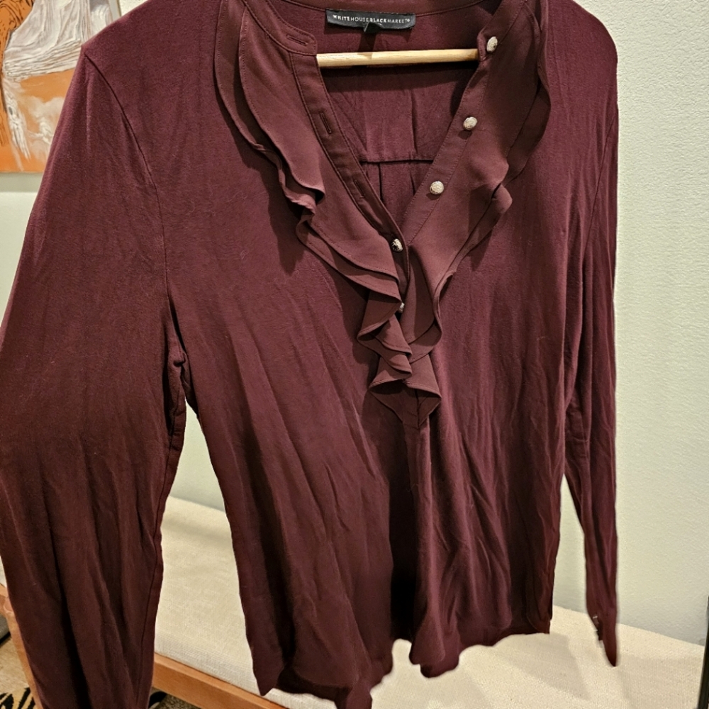 White House Black Market maroon long sleeve top with ruffle and button details